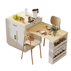 Isla de cocina con mesa de comedor extensible y espacio de almacenamiento